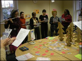 Led by fleurtist Victoria Webb, Social Work perform their festive song for the judges